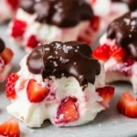 Close-up of delicious chocolate strawberry yogurt clusters, a healthy frozen dessert recipe.