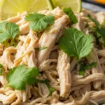Juicy and flavorful Cilantro Lime Chicken cooked in a slow cooker. Perfect for tacos, bowls, and meal prepping.