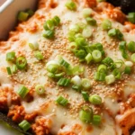 Close-up of a golden-brown Spicy Salmon Sushi Bake, a delicious and easy alternative to traditional sushi.