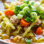 Bowl of delicious egg roll soup, gluten-free recipe, ready in 40 minutes.